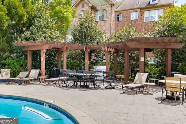 community pool with a patio, outdoor dining area, and a pergola