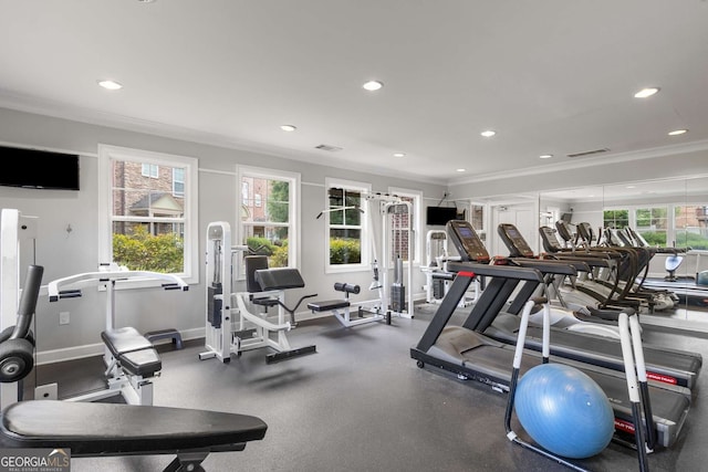 gym with recessed lighting, visible vents, baseboards, and crown molding