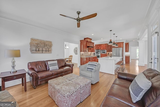 866 Coopers Ridge Path SW, Grayson, GA 30017 - living area with ceiling fan, light wood-style flooring, crown molding, and recessed lighting