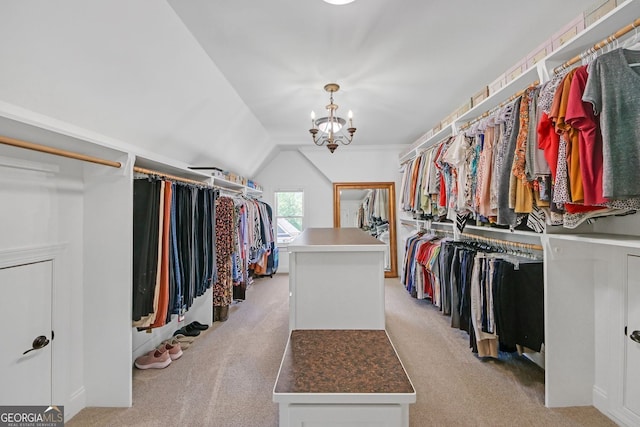 866 Coopers Ridge Path SW, Grayson, GA 30017 - spacious closet with light colored carpet, a chandelier, and vaulted ceiling