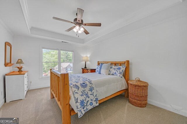 866 Coopers Ridge Path SW, Grayson, GA 30017 - carpeted bedroom featuring a tray ceiling, baseboards, ornamental molding, and a ceiling fan