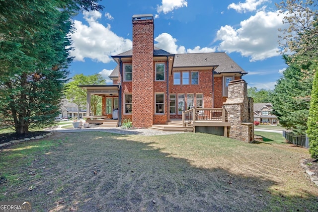 866 Coopers Ridge Path SW, Grayson, GA 30017 - back of house featuring a yard, brick siding, and a chimney