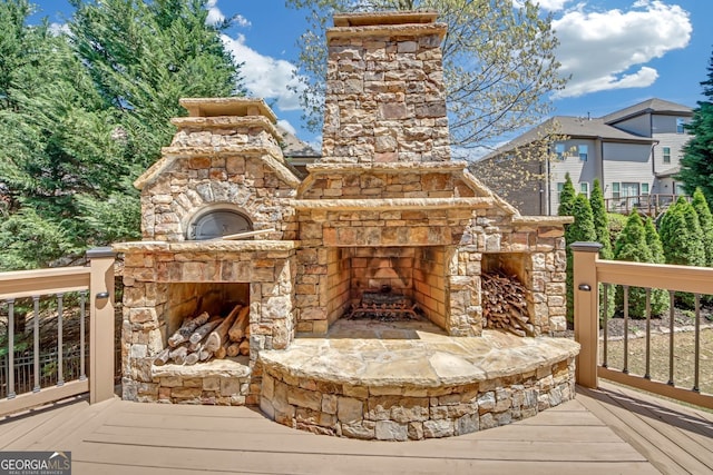 866 Coopers Ridge Path SW, Grayson, GA 30017 - wooden terrace with an outdoor stone fireplace