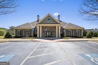 866 Coopers Ridge Path SW, Grayson, GA 30017 - view of building exterior featuring uncovered parking
