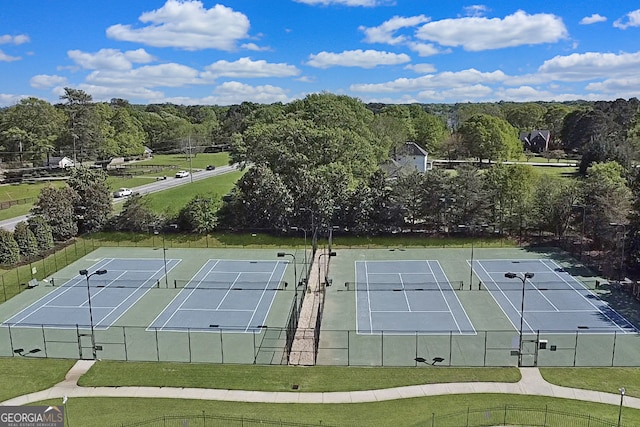 866 Coopers Ridge Path SW, Grayson, GA 30017 - view of tennis court featuring a wooded view
