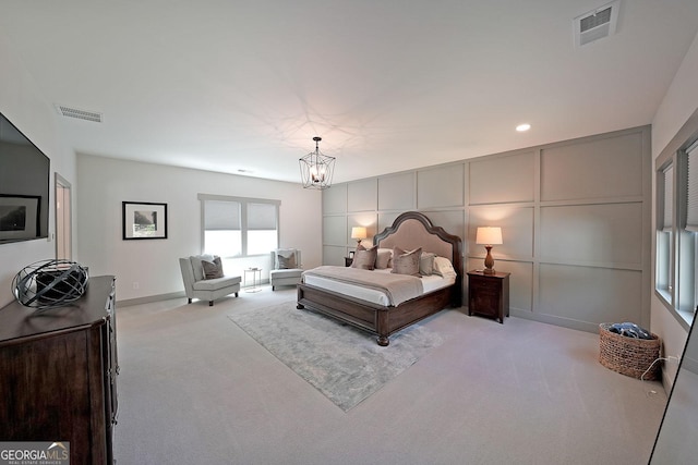16080 Freemanville Rd, Alpharetta, GA 30004 - bedroom featuring light carpet, a decorative wall, and a chandelier