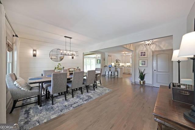16080 Freemanville Rd, Alpharetta, GA 30004 - dining space featuring a chandelier and wood finished floors
