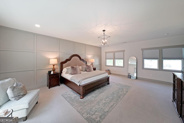 16080 Freemanville Rd, Alpharetta, GA 30004 - bedroom with light carpet, a chandelier, a decorative wall, baseboards, and recessed lighting