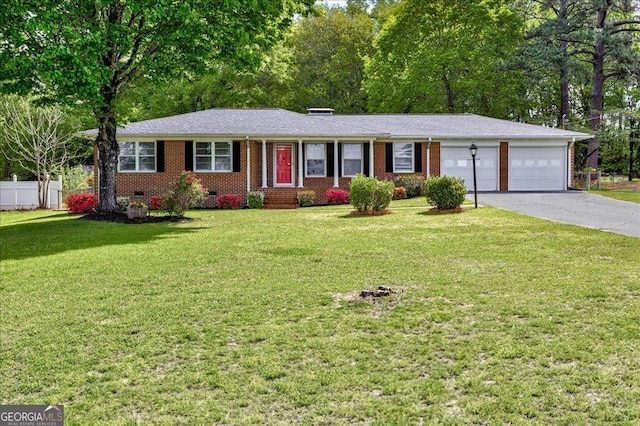 241 Burke Cir, Mcdonough, GA 30253 - ranch-style house with aphalt driveway, brick siding, a front yard, a garage, and fence