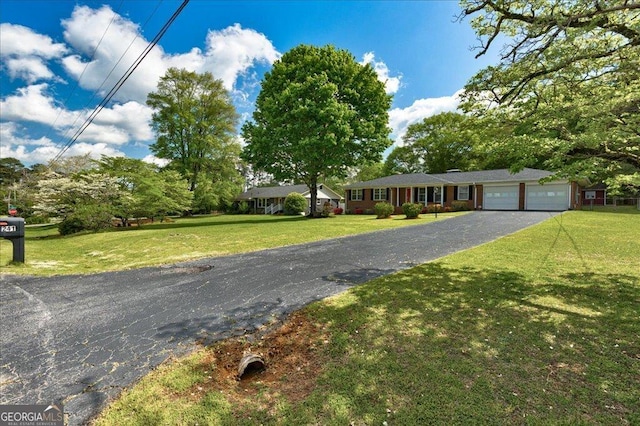 241 Burke Cir, Mcdonough, GA 30253 - ranch-style house featuring a garage, a front yard, and driveway