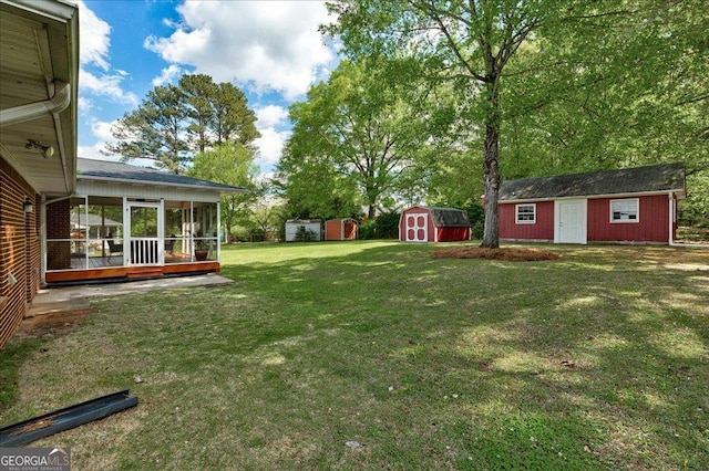 241 Burke Cir, Mcdonough, GA 30253 - view of yard featuring a sunroom, a shed, and an outdoor structure