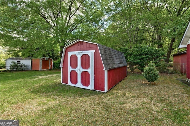 241 Burke Cir, Mcdonough, GA 30253 - view of shed featuring fence
