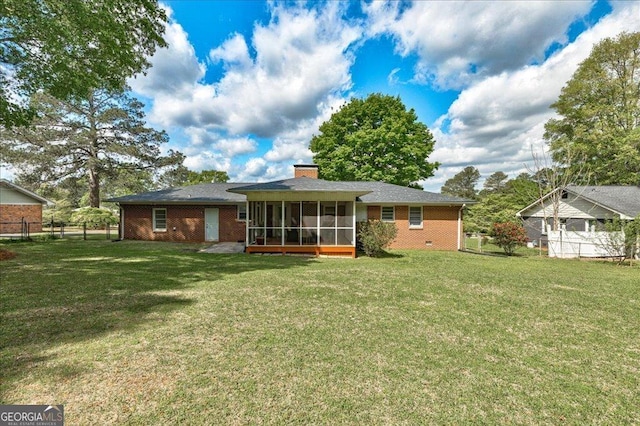 241 Burke Cir, Mcdonough, GA 30253 - rear view of house featuring a chimney, brick siding, a sunroom, a yard, and fence
