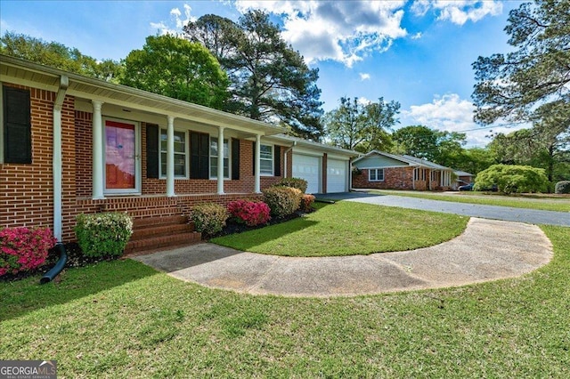 241 Burke Cir, Mcdonough, GA 30253 - single story home featuring brick siding, a front yard, an attached garage, and driveway