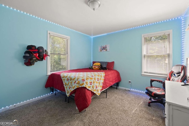 840 Whitby Dr, Douglasville, GA 30134 - carpeted bedroom featuring baseboards