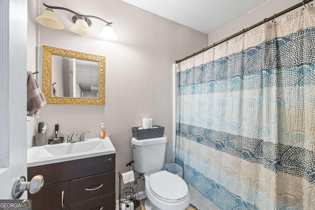 840 Whitby Dr, Douglasville, GA 30134 - full bath featuring toilet, vanity, and a shower with shower curtain