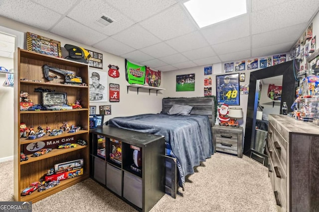 840 Whitby Dr, Douglasville, GA 30134 - carpeted bedroom with a paneled ceiling and visible vents