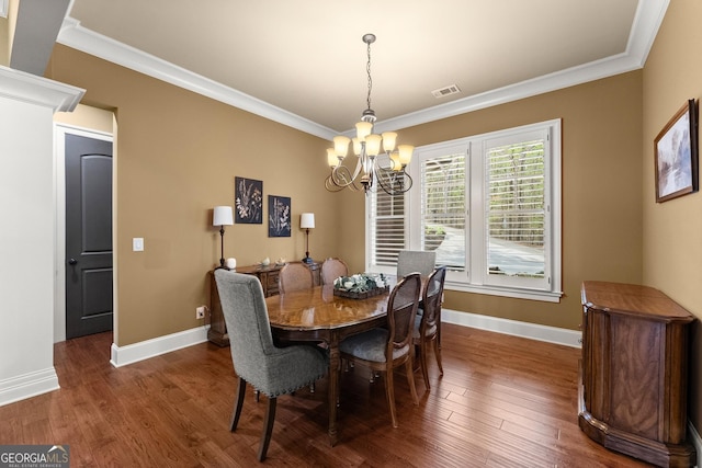 176 Stamp Mill Ln, Dahlonega, GA 30533 - dining room featuring a chandelier, baseboards, ornamental molding, and visible vents