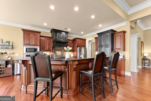 176 Stamp Mill Ln, Dahlonega, GA 30533 - kitchen featuring tasteful backsplash, a large island, appliances with stainless steel finishes, and recessed lighting