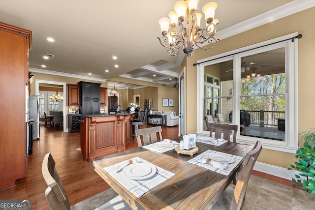 176 Stamp Mill Ln, Dahlonega, GA 30533 - dining space with crown molding, an inviting chandelier, baseboards, and recessed lighting