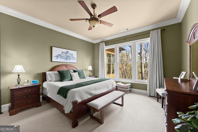 176 Stamp Mill Ln, Dahlonega, GA 30533 - bedroom with crown molding, ceiling fan, visible vents, light carpet, and baseboards