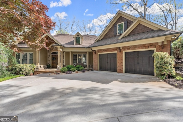 176 Stamp Mill Ln, Dahlonega, GA 30533 - craftsman inspired home featuring roof with shingles, driveway, a garage, and brick siding