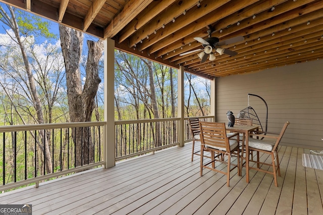 176 Stamp Mill Ln, Dahlonega, GA 30533 - wooden terrace featuring outdoor dining area and a ceiling fan