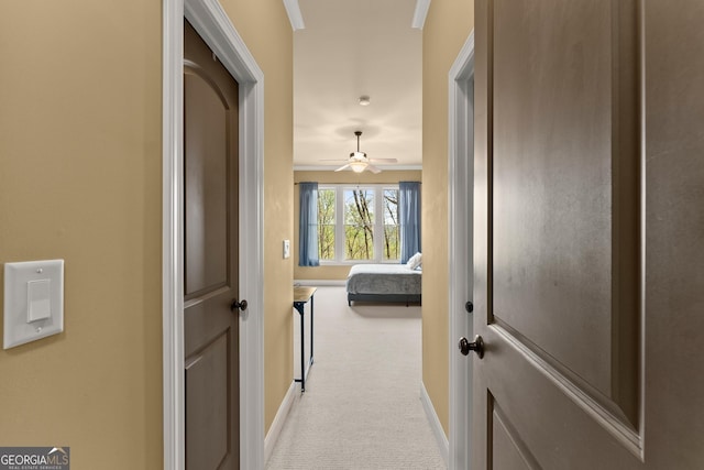 176 Stamp Mill Ln, Dahlonega, GA 30533 - hall with baseboards, light colored carpet, and ornamental molding