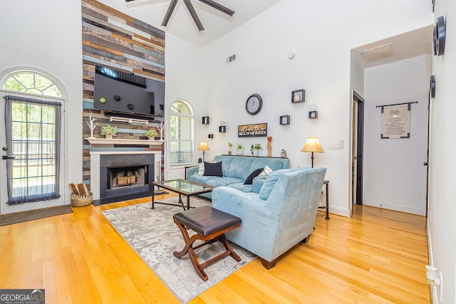 208 Jasmine Ln, Lagrange, GA 30241 - living room with wood finished floors, a towering ceiling, and plenty of natural light