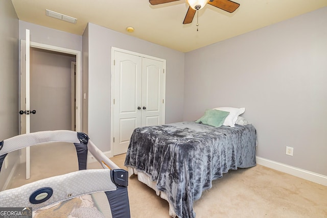 208 Jasmine Ln, Lagrange, GA 30241 - bedroom featuring a closet, ceiling fan, light carpet, baseboards, and visible vents