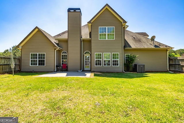 208 Jasmine Ln, Lagrange, GA 30241 - back of house with a patio area, a fenced backyard, a yard, and central AC unit