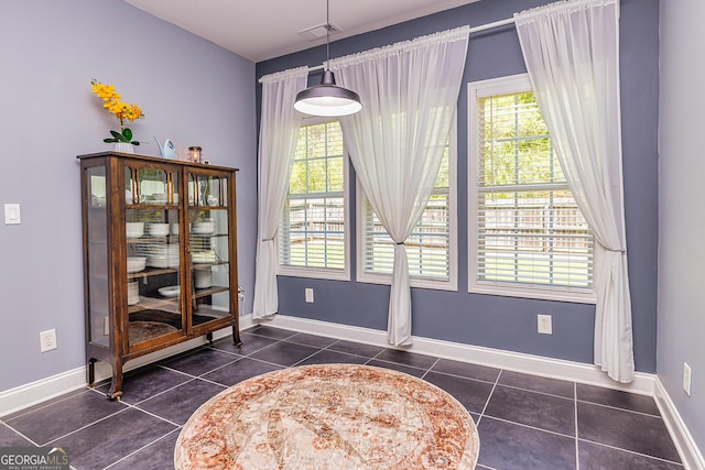 208 Jasmine Ln, Lagrange, GA 30241 - dining area featuring visible vents, baseboards, and dark tile patterned flooring