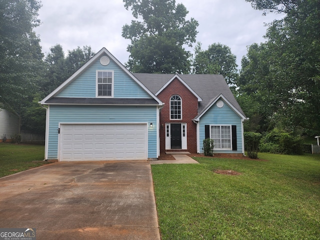 traditional home featuring concrete driveway, a front yard, and an attached garage