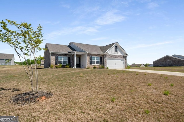 1259 Fendt Dr, Locust Grove, GA 30248 - view of front of home featuring a front yard, concrete driveway, brick siding, and an attached garage