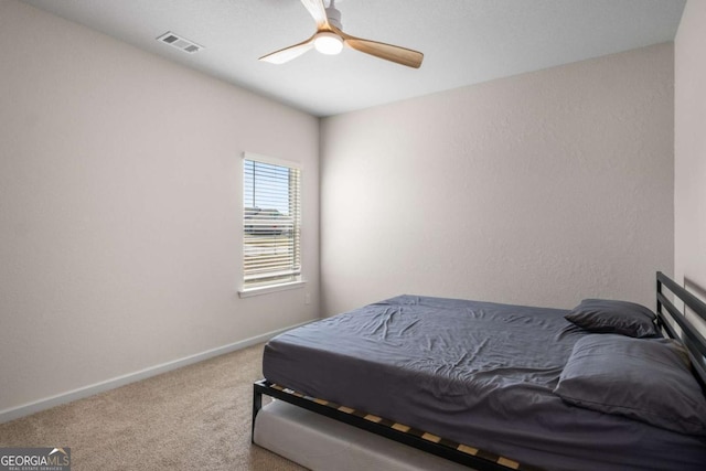 1259 Fendt Dr, Locust Grove, GA 30248 - bedroom with carpet flooring and a ceiling fan