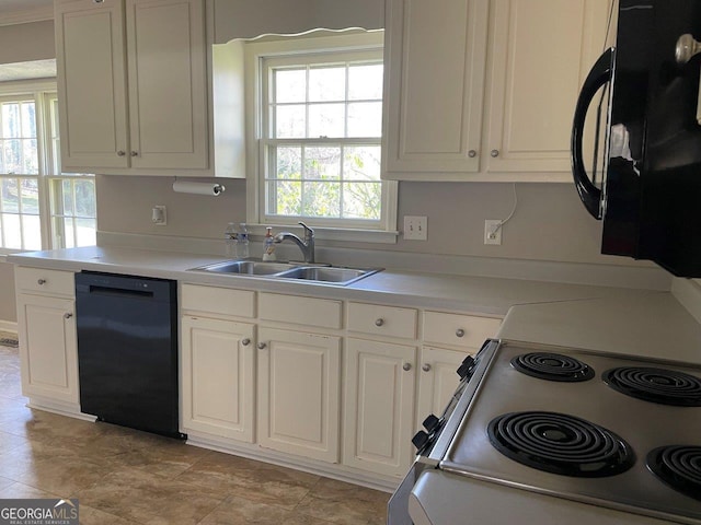 3021 Tiffin Cir, Macon, GA 31204 - kitchen featuring a healthy amount of sunlight, white cabinetry, a sink, and black appliances