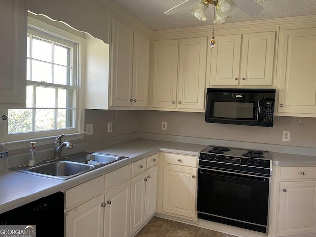 3021 Tiffin Cir, Macon, GA 31204 - kitchen featuring a sink, white cabinetry, a ceiling fan, light countertops, and black appliances