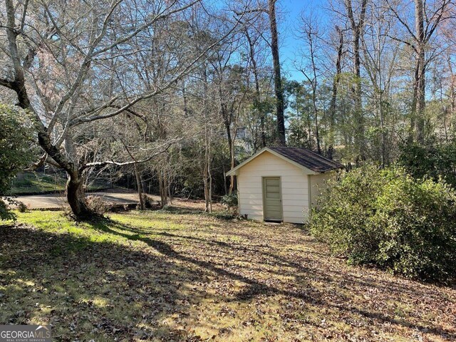 3021 Tiffin Cir, Macon, GA 31204 - view of yard featuring an outbuilding and a storage shed