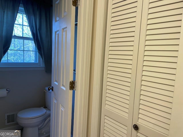 3021 Tiffin Cir, Macon, GA 31204 - bathroom featuring visible vents and toilet