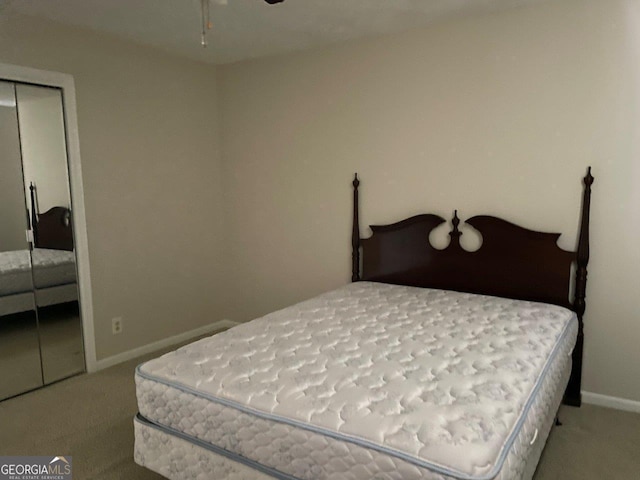 3021 Tiffin Cir, Macon, GA 31204 - bedroom featuring carpet, a closet, and baseboards