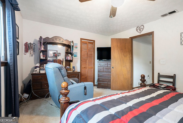1292 Marcelle Heights Pl NW, Norcross, GA 30093 - carpeted bedroom with a closet, a ceiling fan, and a textured ceiling
