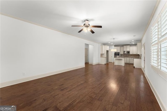 unfurnished living room featuring ceiling fan, baseboards, recessed lighting, and dark wood-style flooring