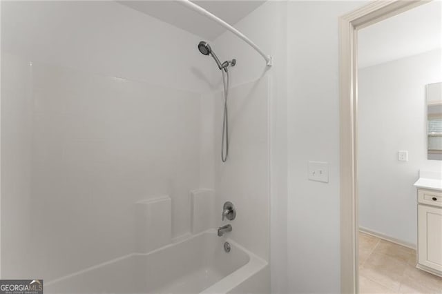 full bath with tile patterned floors, vanity, and shower / bathtub combination