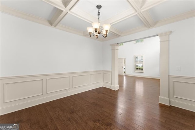 unfurnished dining area featuring a notable chandelier, beam ceiling, ornate columns, dark wood-type flooring, and coffered ceiling