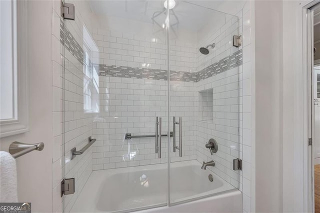 934 Pine Cir, Woodstock, GA 30189 - bathroom featuring shower / bath combination with glass door