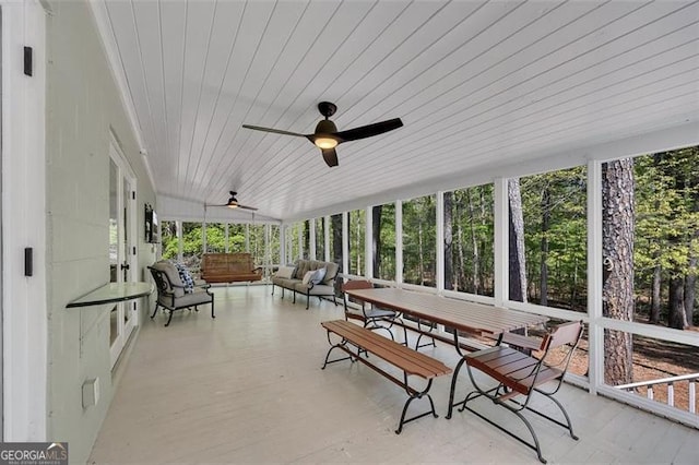 934 Pine Cir, Woodstock, GA 30189 - sunroom / solarium featuring ceiling fan and an outdoor living space