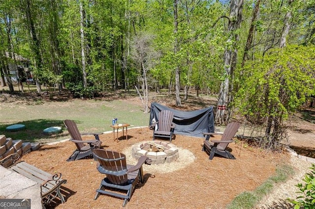 934 Pine Cir, Woodstock, GA 30189 - view of yard featuring a fire pit