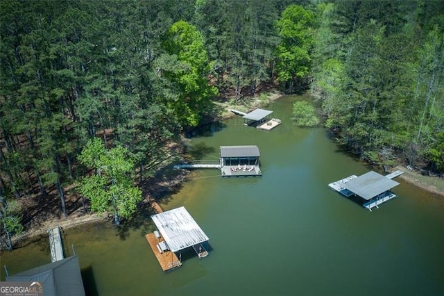 934 Pine Cir, Woodstock, GA 30189 - birds eye view of property featuring a forest view and a water view