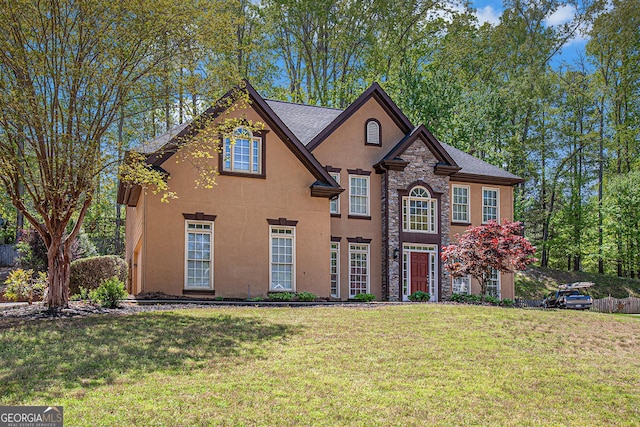 4609 Mctyre Way NW, Marietta, GA 30064 - view of front of home with stucco siding, a front lawn, and stone siding