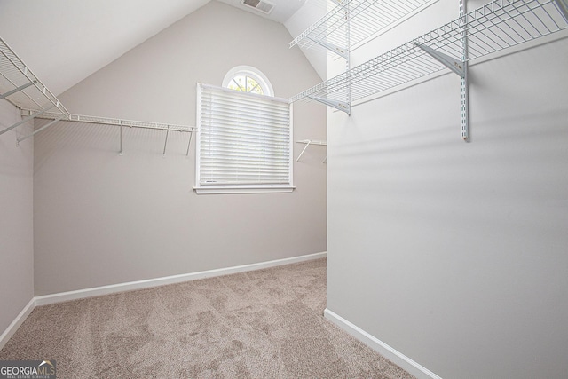 4609 Mctyre Way NW, Marietta, GA 30064 - walk in closet with carpet flooring and lofted ceiling